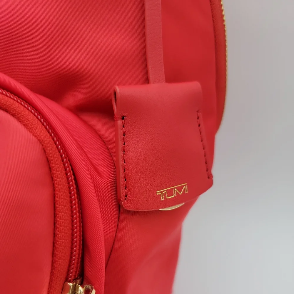 Tumi Red Backpack with Gold Hardware